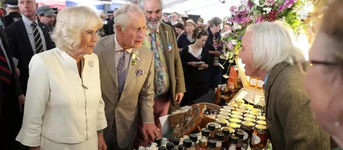 Serving the Duke and Duchess of Cornwall at the Kings Orchard Honey Stall, Royal Cornwall Show 2022